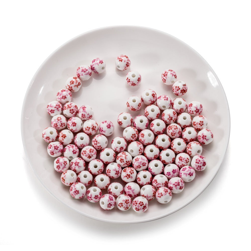 Al por mayor 10pcs/paquete de colgantes de ciruela de cerámica de estilo chino cuentas de cuerda de bricolaje de bricolaje